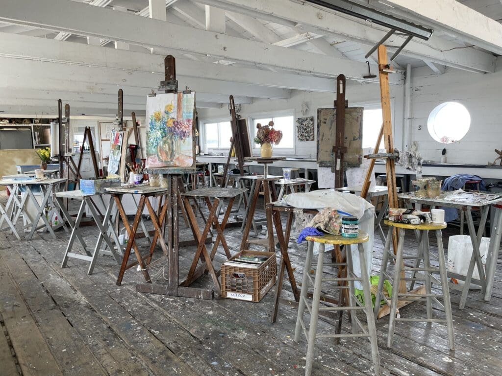 Art studio with easels and paint.
